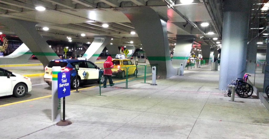ohare airport taxi line on ground level pickup - Go Chicago Limo ohare airport taxi line on ground level pickup