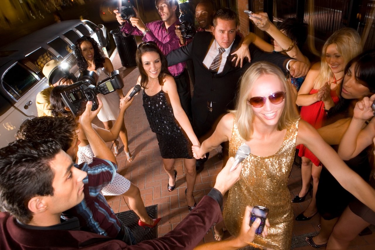 celebrities and paparazzi arriving at a gala event in Schaumburg
